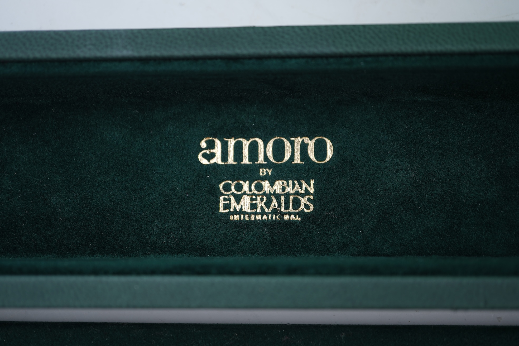 A lady's 2002 gilt steel Raymond Weil quartz wrist watch, with mother of pearl dial and simulated diamond dot numerals, with box and papers.